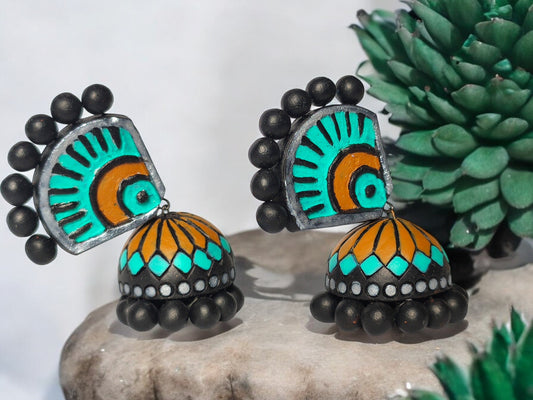 Aachal ethnic terracotta jhumka earrings by Anusangi Collections with vibrant blue and orange design