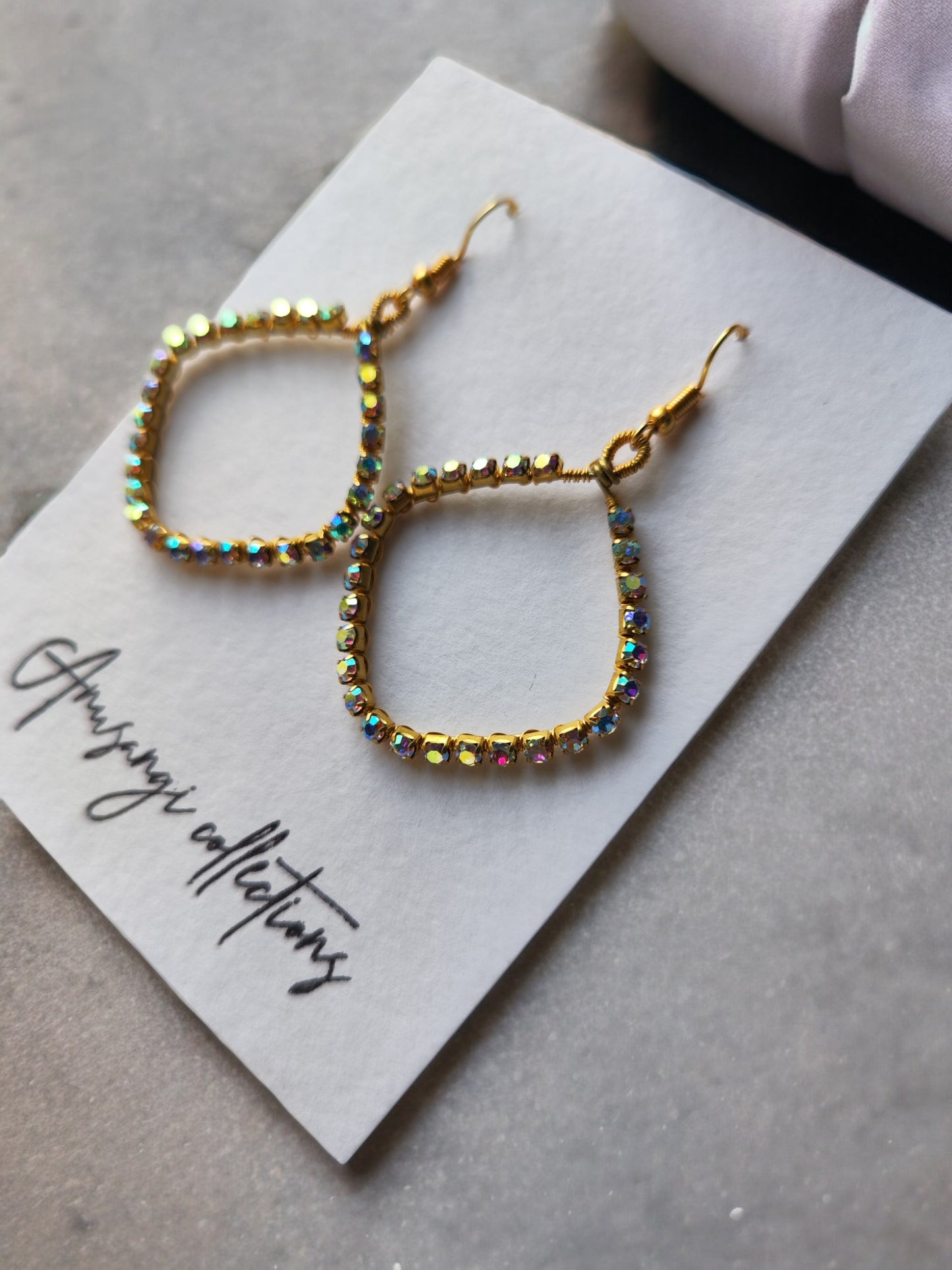 Annika square beaded earrings from Anusangi Collections with shimmering multicolor beads on gold hooks
