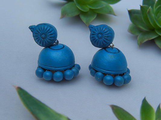 Anusangi Collections peacock blue terracotta earrings with traditional jhumka design and bead detailing