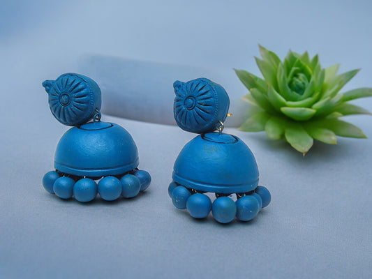 Peacock blue terracotta earrings from Anusangi Collections featuring handcrafted design and bead accents