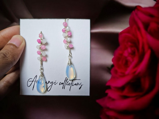 Pink and white beaded earring from Anusangi Collections with delicate pink beads and teardrop pendants