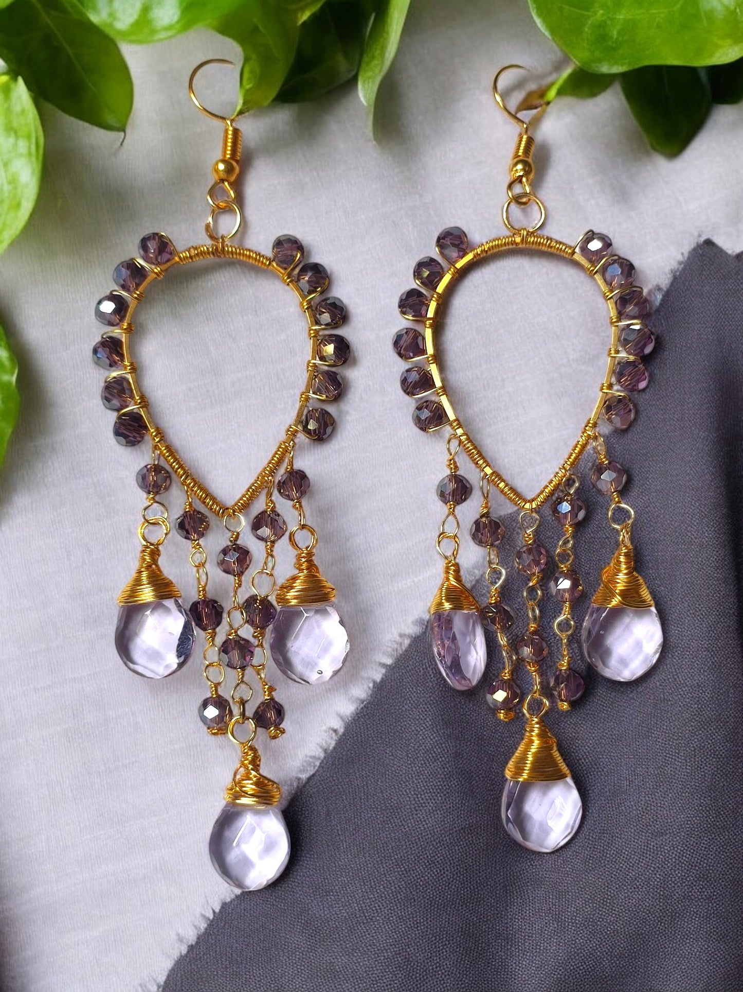 Anusangi Collections violet crystal earrings with gold wire and delicate beaded design