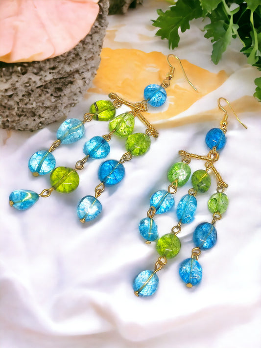 Anusangi Collections beaded statement earrings featuring blue and green beads with gold accents