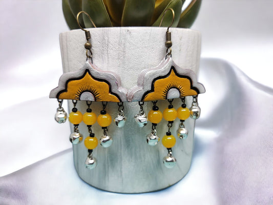 Bohemian style terracotta earrings with yellow beads and silver bells from Anusangi Collections