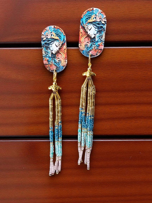 Colorful boho statement dangle earrings with intricate designs and long beaded tassels
