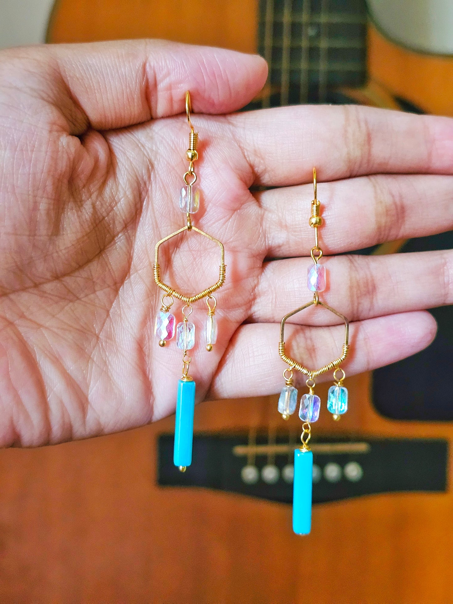 Anusangi Collections beaded boho statement earrings for women with gold hexagon and blue accents