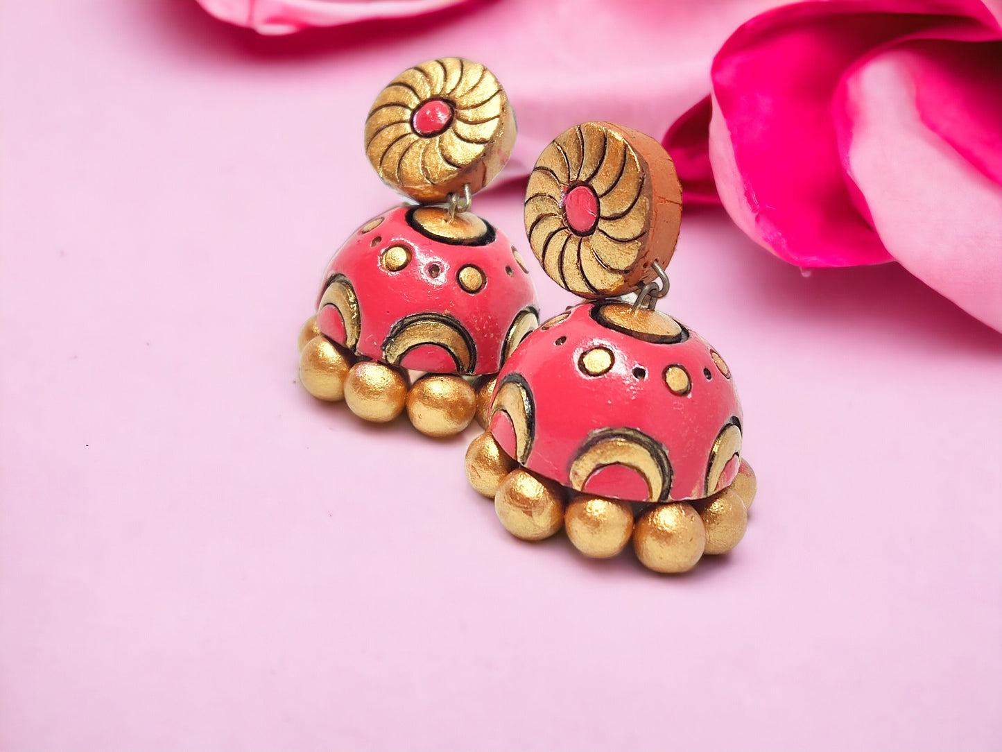 Pink terracotta jhumka earrings with gold accents by Anusangi Collections buy pink jhumka earrings online