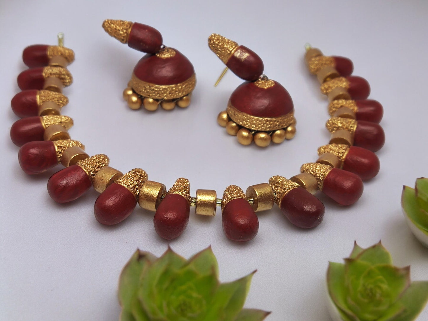 Classic terracotta necklace and earring set in red and gold from Anusangi Collections