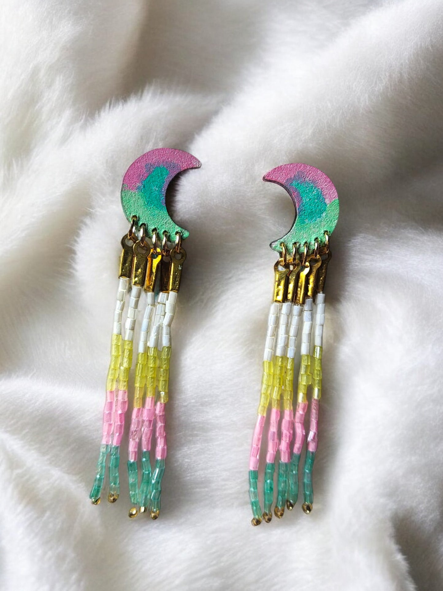 Colorful boho beaded jewelry with crescent moon design and multicolor beaded tassels from Anusangi Collections
