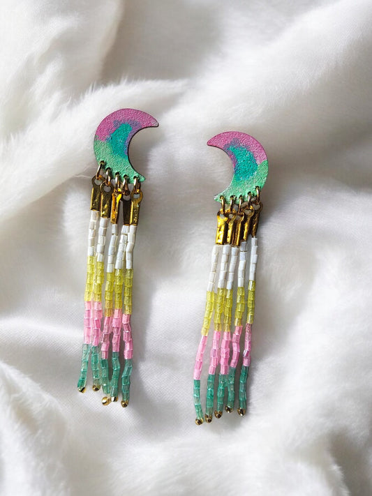 Colorful boho beaded jewelry featuring Anusangi Collections crescent moon earrings with multi-colored bead fringe