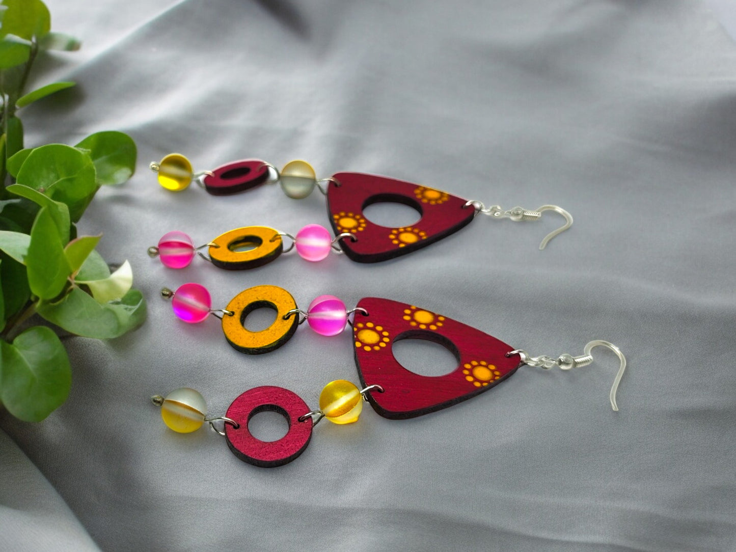 Colorful terracotta earrings for women with round and triangular beads in red, yellow, and pink from Anusangi Collections