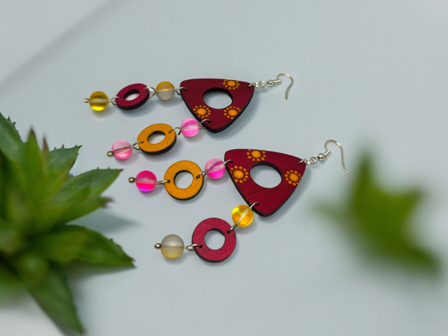 Colorful terracotta earrings for women with red and orange beads from Anusangi Collections