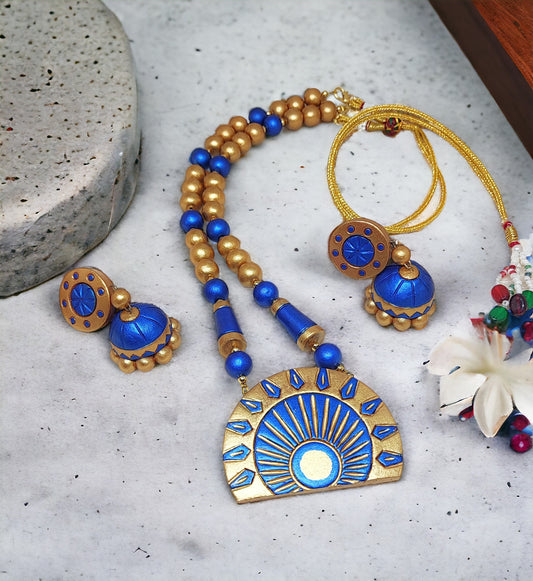 Dark blue terracotta jewelry set from Anusangi Collections featuring necklace and matching earrings