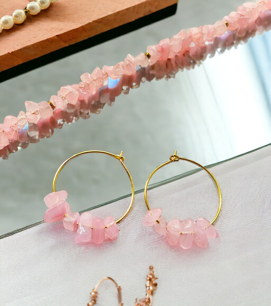 Fresh water pearl and pink chips necklace and earring set from Anusangi Collections displayed on reflective surface