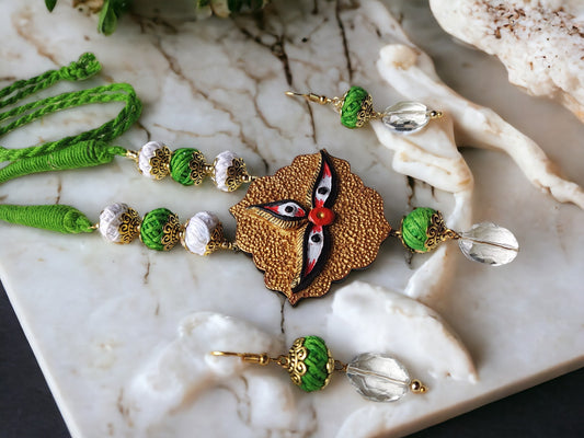 Goddess Durga Terracotta statement jewelry set from Anusangi Collections with green and white beads