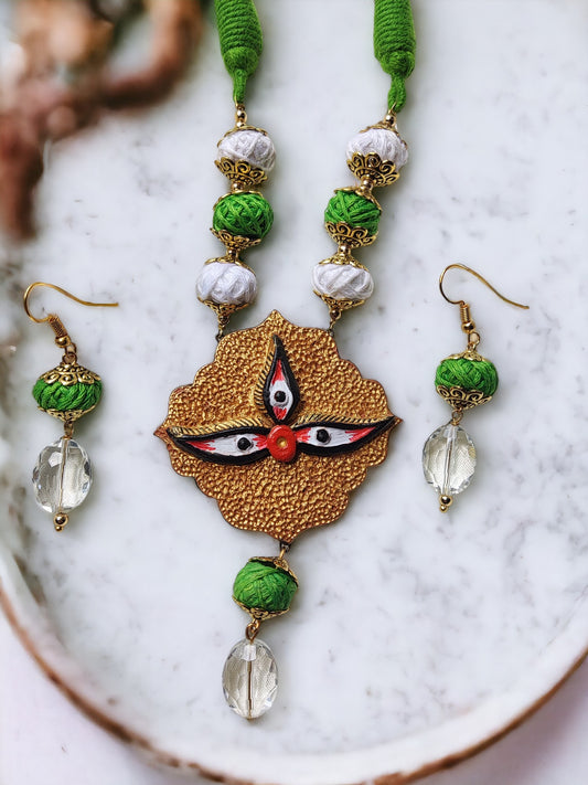 Anusangi Collections goddess Durga Terracotta statement jewelry set with green and white beads and gold-tone pendant