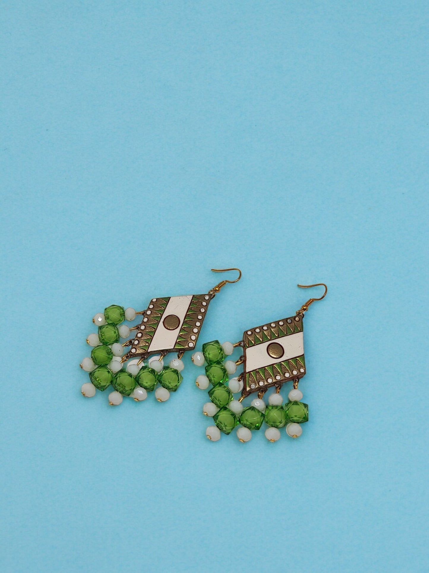 Green geometric design terracotta earrings with bead and mirror detailing from Anusangi Collections