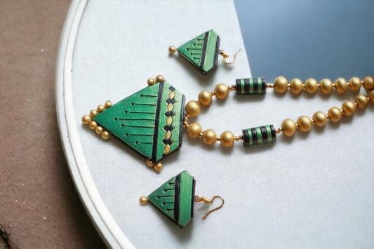 Green terracotta necklace and earring set with gold bead accents from Anusangi Collections