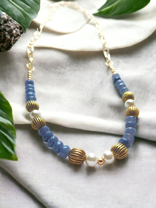 Grey bead necklace gold accents featuring unique design and elegant detailing