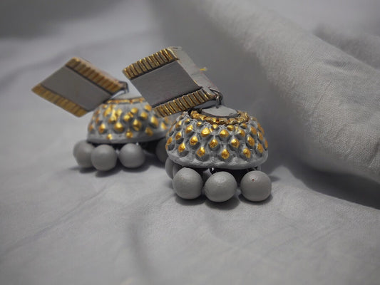 Anusangi Collections grey terracotta earrings with gold accents and bead dangles