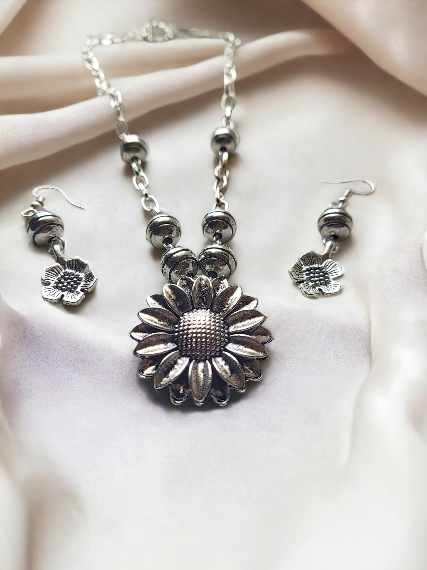 Anusangi Collections handmade daily wear jewelry silver sunflower necklace and matching earrings set