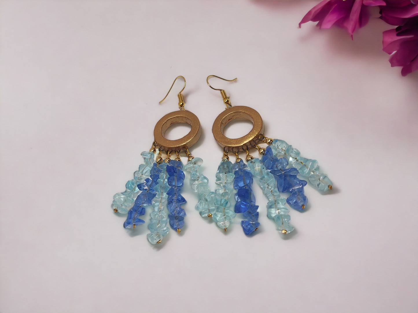 Anusangi Collections handmade dreamcatcher earrings with blue and light blue beads and circular gold frames