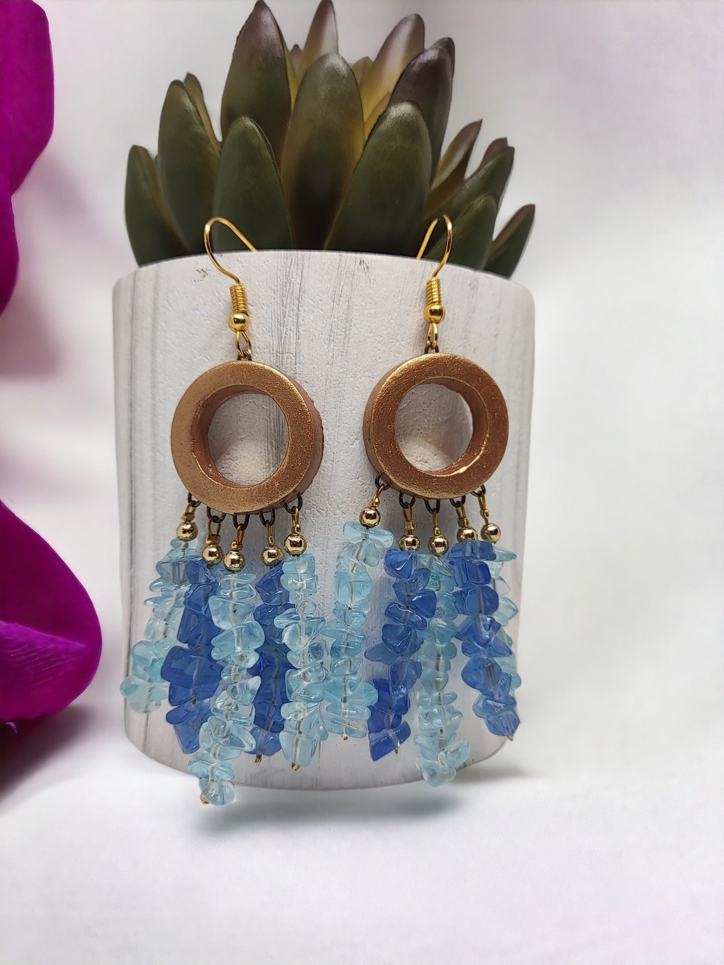 Handmade dreamcatcher earrings by Anusangi Collections with blue beaded tassels and wooden circular hoops
