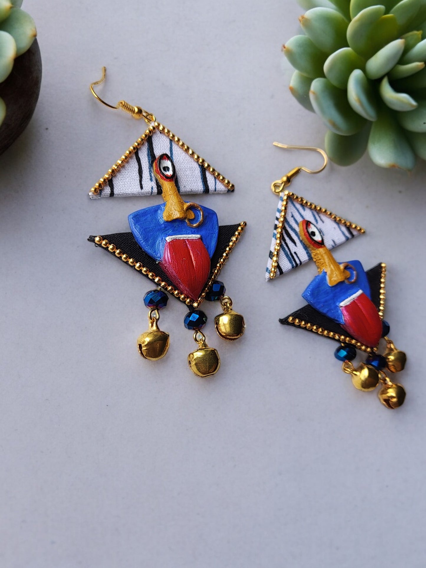 Colorful handmade fabric earrings with gold accents and unique artistic design by Anusangi Collections