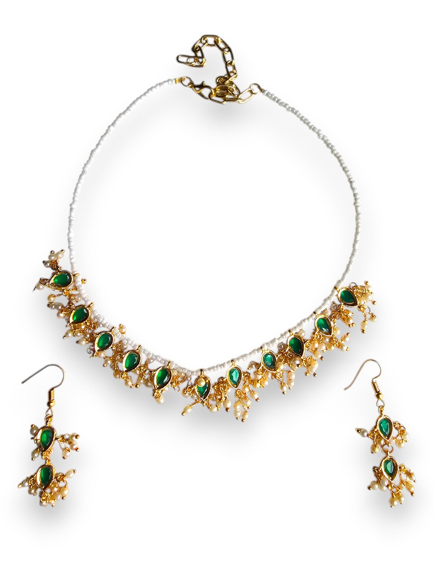 Anusangi Collections handmade gold necklace with emerald green beads and matching earrings