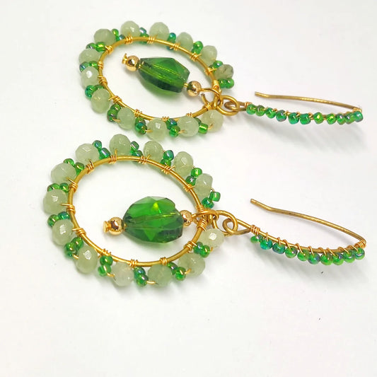 Handmade green wire wrap earrings with green beads and gold wire from Anusangi Collections