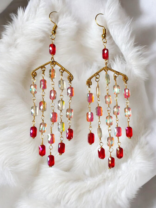 Handmade long dangle earrings with red and iridescent beads on gold chains by Anusangi Collections