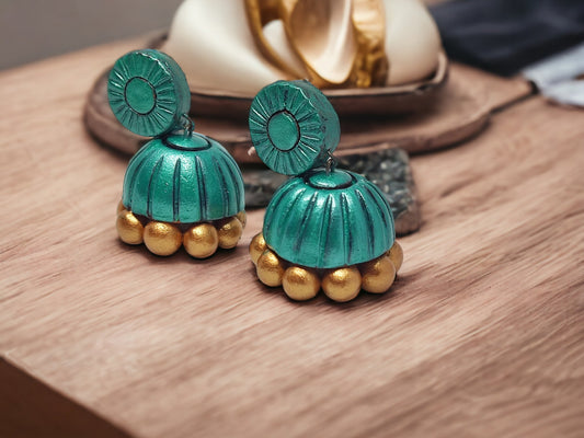Handmade terracotta jhumka earrings in teal with golden bead accents from Anusangi Collections