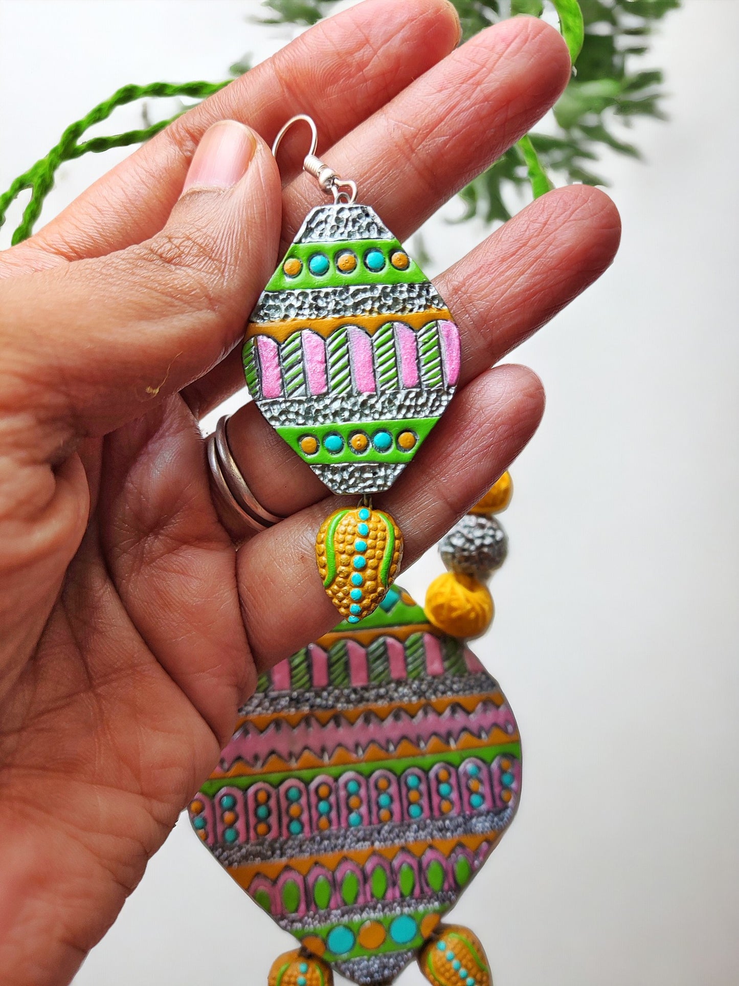 Terracotta jewelry set from Anusangi Collections featuring colorful traditional Indian jewelry for women