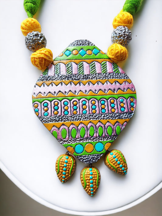 Anusangi Collections terracotta jewelry set featuring traditional Indian jewelry for women with colorful hand-painted design