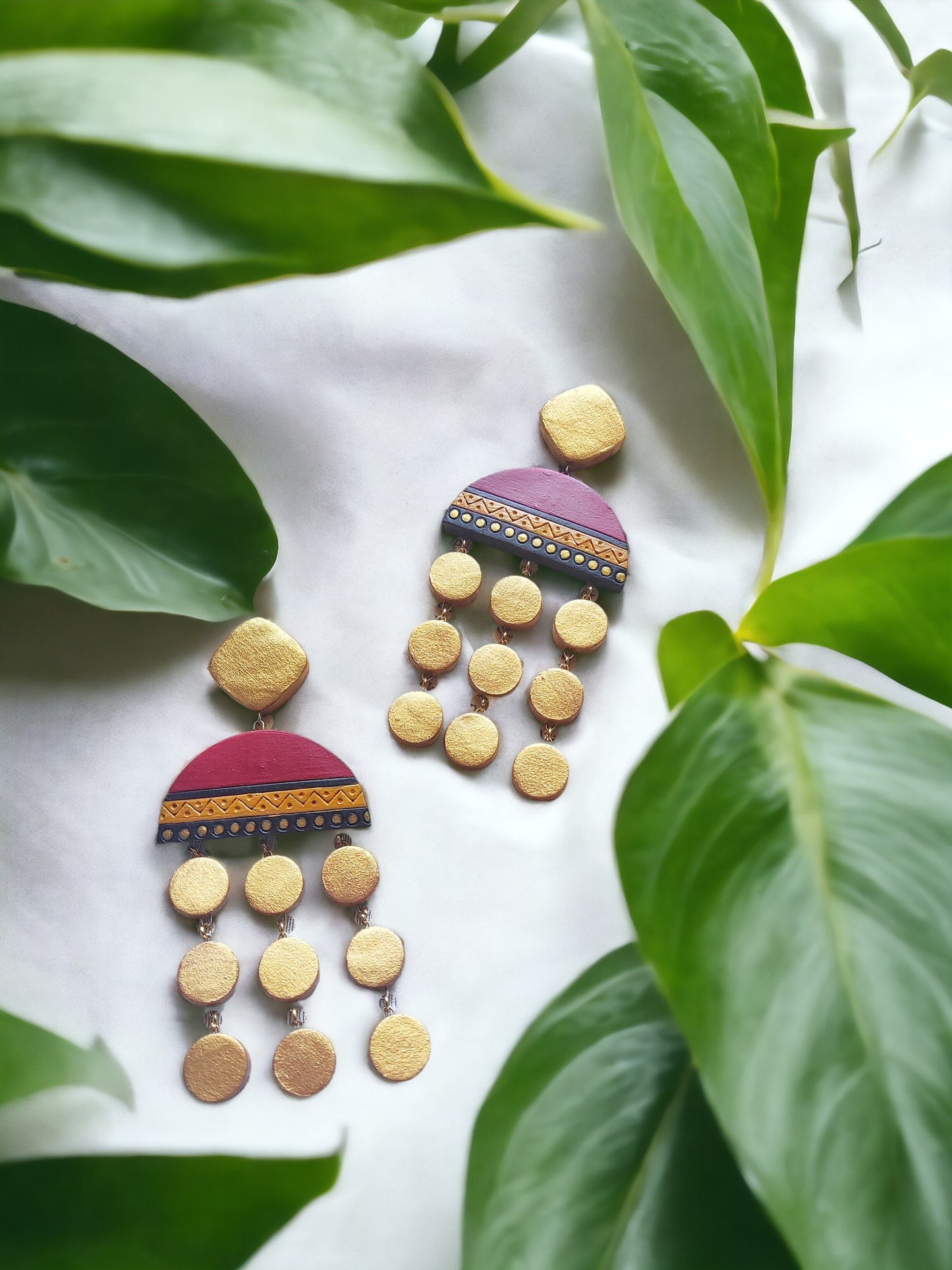 Anusangi Collections Ishani long earrings terracotta handcrafted with gold and maroon design