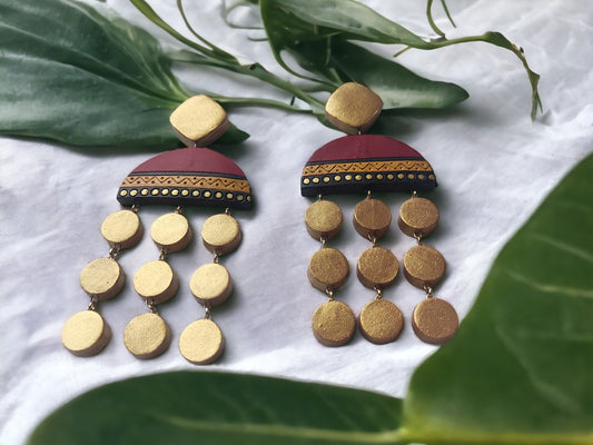 Anusangi Collections Ishani long earrings terracotta handcrafted with gold and maroon detailing