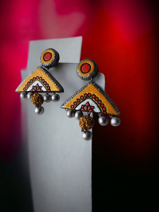 Anusangi Collections Kasturi terracotta jewelry yellow and orange triangular earrings with silver beads
