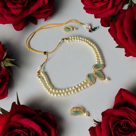 Kundan choker necklace for women with pearl beads and green stone embellishments from Anusangi Collections