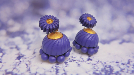 Lavender terracotta earrings by Anusangi Collections with floral top and bead details