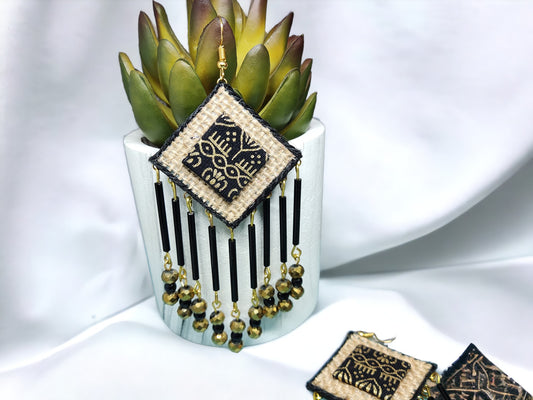 Layla-boho-fabric-statement-earrings by Anusangi Collections with black and beige fabric and gold bead details
