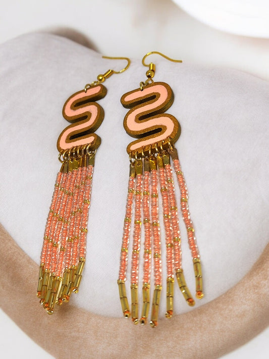 Anusangi Collections long beaded earrings for women with peach and gold beaded tassels