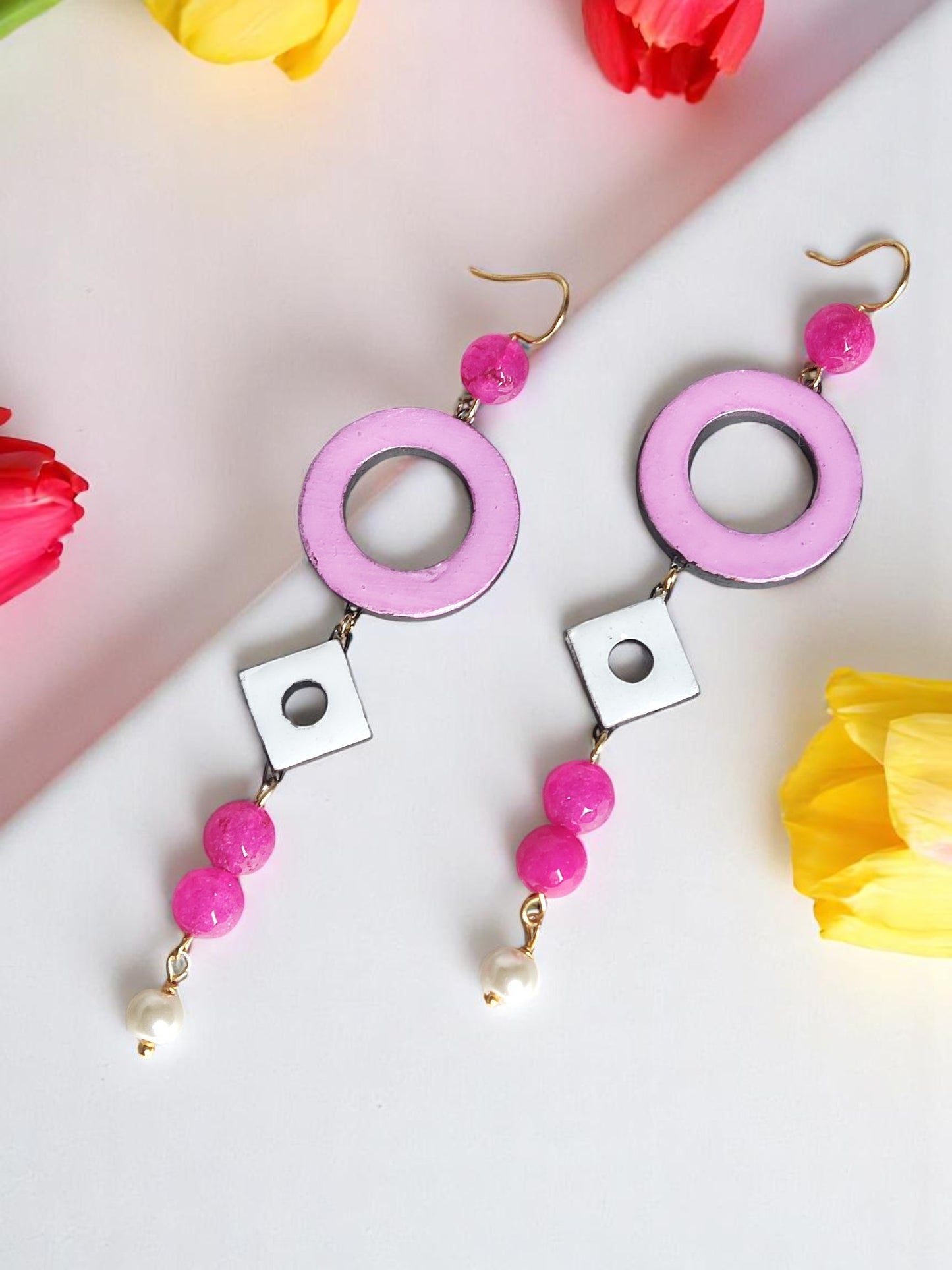 Mahika terracotta long earring by Anusangi Collections in pink and white with pearl and geometric design