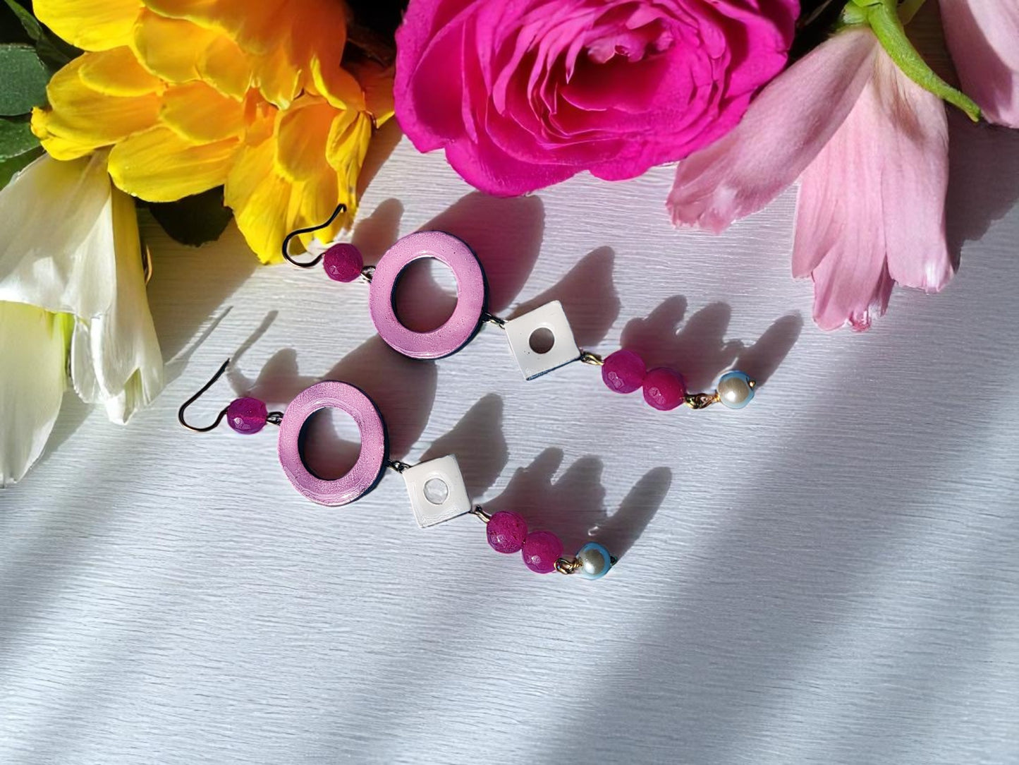 Mahika terracotta long earring from Anusangi Collections in pink with circular and bead design
