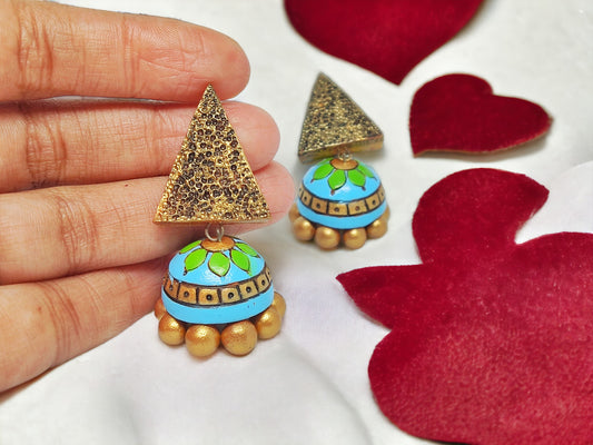 Colorful terracotta Nalini jhumka earrings online with blue and green floral design by Anusangi Collections
