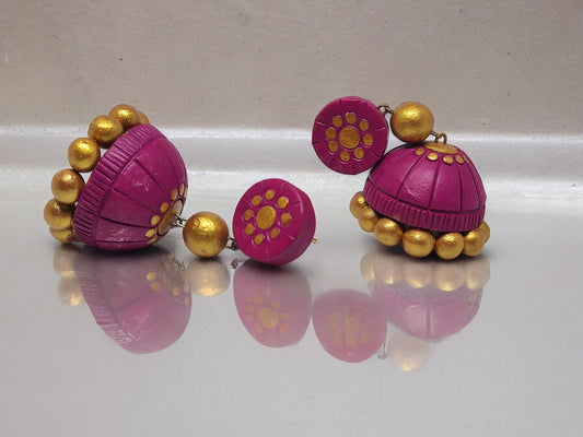 Pink terracotta jhumka earrings with gold bead detailing from Anusangi Collections