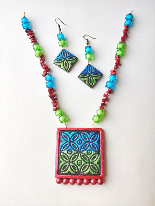 Psychedelic zentangle jewelry set terracotta necklace and earrings with blue green and red beads