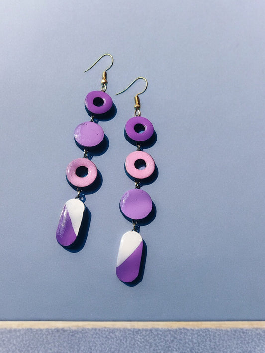 Anusangi Collections purple statement earrings made of terracotta with circular and geometric shapes