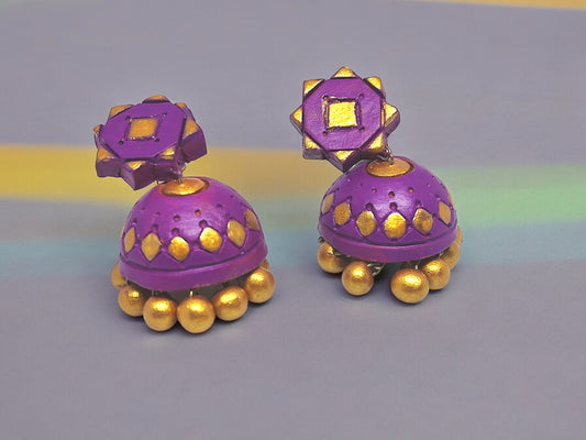 Pair of purple terracotta earrings with gold accents from Anusangi Collections