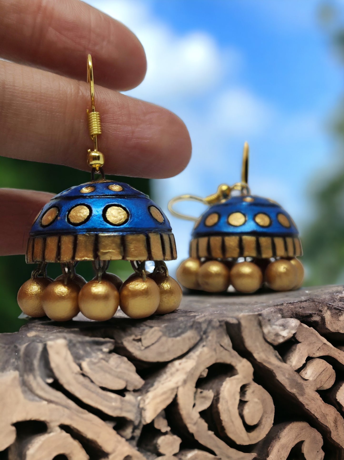 Rambha Jhumka Terracotta Earring in blue and gold with dangling golden beads from Anusangi Collections