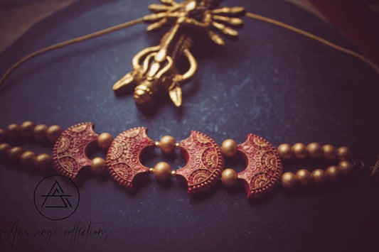 Anusangi Collections scarlet terracotta necklace set with intricate red crescent beads and round accents